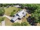 Aerial view of home with large metal roof, covered porch and car port at 3360 Se 183Rd Avenue Rd, Ocklawaha, FL 32179
