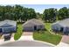Scenic aerial view of a single-Gathering home with lush landscaping and a brick driveway at 4306 Nw 54Th Ter, Ocala, FL 34482
