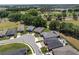 An aerial view of the neighborhood featuring well-maintained landscaping, sidewalks, and community spaces at 4306 Nw 54Th Ter, Ocala, FL 34482