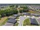 An aerial view of a residential community, landscaped lots, and well-maintained streets at 4306 Nw 54Th Ter, Ocala, FL 34482