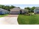 Charming single-story home with a well-manicured lawn and inviting curb appeal at 4306 Nw 54Th Ter, Ocala, FL 34482