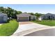 Well-maintained home with a brick driveway, lush lawn, and inviting curb appeal at 4306 Nw 54Th Ter, Ocala, FL 34482