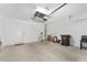Clean two-car garage with automatic door, room for storage and extra refrigerator at 4306 Nw 54Th Ter, Ocala, FL 34482