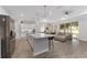 Bright, open kitchen featuring an island with seating, and easy access to the living room at 4306 Nw 54Th Ter, Ocala, FL 34482