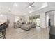 Spacious living area with access to the backyard through sliding glass doors, blending indoor and outdoor living at 4306 Nw 54Th Ter, Ocala, FL 34482