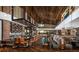 Upscale bar and restaurant with wood floors, leather chairs, brick accents, and a lively ambiance, perfect for dining at 4306 Nw 54Th Ter, Ocala, FL 34482