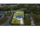 Birds eye view of a home with a huge yard, fenced in and nestled in a residential community at 4324 Sw 98Th Ln, Ocala, FL 34476