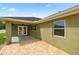 Exterior of the home with a back patio at 4324 Sw 98Th Ln, Ocala, FL 34476