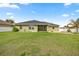 Large backyard with green grass perfect for entertaining at 4324 Sw 98Th Ln, Ocala, FL 34476