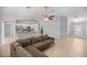 Bright and airy living space, featuring a modern kitchen and neutral color palette, perfect for relaxation and entertaining at 4324 Sw 98Th Ln, Ocala, FL 34476