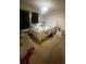 Bedroom featuring a white bed, carpet and lots of natural light at 45 Hickory Track Way, Ocala, FL 34472