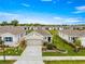 A nice home in a desirable community featuring beautiful landscaping and well-maintained lawns at 5220 Sunshine Dr, Wildwood, FL 34785