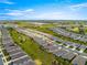 This aerial features a home in a well-planned community near shopping and recreation areas at 5220 Sunshine Dr, Wildwood, FL 34785