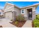 Charming single Gathering home featuring stone accents and beautiful landscaping around the property at 5220 Sunshine Dr, Wildwood, FL 34785