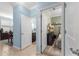 Hallway with tiled floors connecting to the bathroom and bedroom at 5220 Sunshine Dr, Wildwood, FL 34785