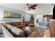 Comfortable living room features plush furniture and ample space for entertaining at 5220 Sunshine Dr, Wildwood, FL 34785