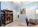 Office space with a desk and bookshelf providing a functional work environment at 5220 Sunshine Dr, Wildwood, FL 34785