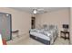 Comfortable bedroom featuring patterned bedding and ample natural light at 5350 Sw 82Nd St, Ocala, FL 34476