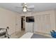 Neutral bedroom with closet, fan, TV, and plenty of storage at 5350 Sw 82Nd St, Ocala, FL 34476