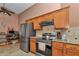 Bright kitchen featuring stainless steel appliances, a gas stove, and plenty of cabinet space at 5350 Sw 82Nd St, Ocala, FL 34476