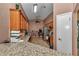 Open concept kitchen with granite countertops, wood cabinets, and stainless steel appliances at 5350 Sw 82Nd St, Ocala, FL 34476