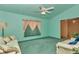 Relaxing living room features bright walls, fan and comfortable furniture at 5350 Sw 82Nd St, Ocala, FL 34476