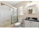 Bright bathroom with a shower/tub combo and vanity, offering comfort and functionality at 5580 Se 21St Ln, Ocala, FL 34480