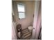 Charming powder room with patterned tile floors, a pedestal sink, and a window for natural light at 6365 Se 12Th Ln, Ocala, FL 34472
