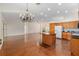 Open layout combines kitchen and living spaces at 712 Harper Pl, Lady Lake, FL 32159