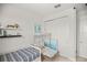 Bedroom with decor, shelving, closet, twin bed, and extra seating at 7687 Sw 63Rd Place Rd, Ocala, FL 34474
