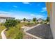 Scenic view showcases the home's exterior with an inviting patio and lush landscaping in a friendly neighborhood at 7696 Sw 86Th Ct, Ocala, FL 34481
