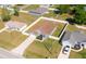 Beautiful single-Gathering home with a white fence, green lawn and driveway to attached garage at 8004 Juniper Rd, Ocala, FL 34480