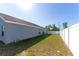 Large backyard featuring a privacy fence, offering a secure and private outdoor space at 8004 Juniper Rd, Ocala, FL 34480