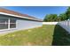 A large backyard featuring a full privacy fence and a well-maintained lawn at 8004 Juniper Rd, Ocala, FL 34480