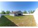 Spacious backyard with a well-maintained lawn and privacy fence, perfect for outdoor activities and relaxation at 8004 Juniper Rd, Ocala, FL 34480