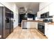 Well-equipped kitchen featuring stainless steel appliances and tile floors at 8004 Juniper Rd, Ocala, FL 34480