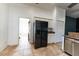 Open kitchen with stainless steel refrigerator and ample cabinet space at 8004 Juniper Rd, Ocala, FL 34480