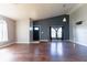 Bright living room with beautiful hardwood floors and modern wall paint at 8004 Juniper Rd, Ocala, FL 34480