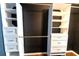 Custom walk-in closet has ample storage with built-in shelving and drawer units at 8004 Juniper Rd, Ocala, FL 34480