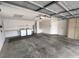 Spacious garage features washer, dryer, sink, and plenty of storage space for all your needs at 8045 Sw 108Th Loop, Ocala, FL 34481