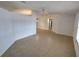 Open-concept living area with tile floors and a view into dining area at 8045 Sw 108Th Loop, Ocala, FL 34481