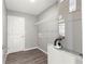 Well-equipped utility room with wire shelving at 87 Guava Pass Dr, Ocklawaha, FL 32179