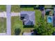 Aerial view of property featuring a well-maintained lawn and a swimming pool at 8895 Sw 57Th Court Rd, Ocala, FL 34476