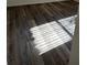 Bedroom with new flooring and sunlight streaming through the blinds at 8895 Sw 57Th Ct Rd, Ocala, FL 34476