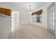 Bright dining area with tile floors and a sliding glass door for access to the yard at 8895 Sw 57Th Court Rd, Ocala, FL 34476