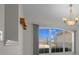 Dining area with chandelier lighting and a large window offering natural light at 8895 Sw 57Th Court Rd, Ocala, FL 34476