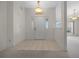 Bright entryway with a tiled floor and a white front door with sidelights at 8895 Sw 57Th Court Rd, Ocala, FL 34476