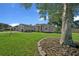 Charming single-story home featuring a well-kept lawn, mature trees, and inviting curb appeal at 8895 Sw 57Th Ct Rd, Ocala, FL 34476