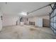 Large garage with additional space for storage and access to utilities at 8895 Sw 57Th Court Rd, Ocala, FL 34476