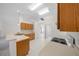 Kitchen featuring wood cabinets and stainless steel appliances at 8895 Sw 57Th Court Rd, Ocala, FL 34476